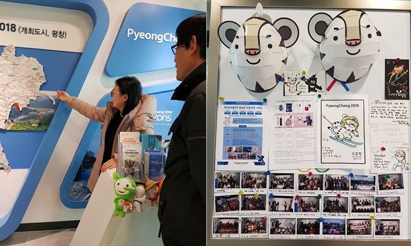 평창동계올림픽을 설명하고 있는 전혜경씨와 홍보관을 다녀간 사람들의 기념사진